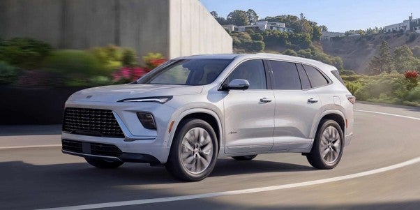 2027 Buick Enclave, a compact SUV, displayed in various trims showcasing its sleek design and modern features.